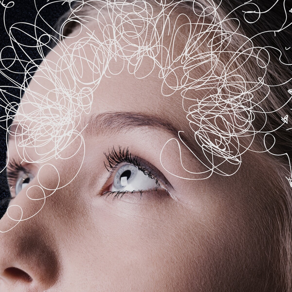 White squiggles around a woman's head