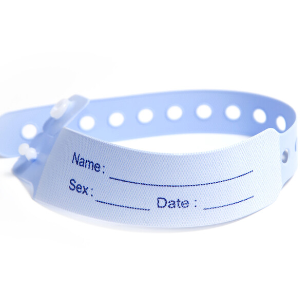 hospital wrist tag on white background