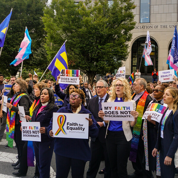 A group of faith leaders at an LGBTQIA+ rights protest
