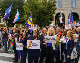 A group of faith leaders at an LGBTQIA+ rights protest