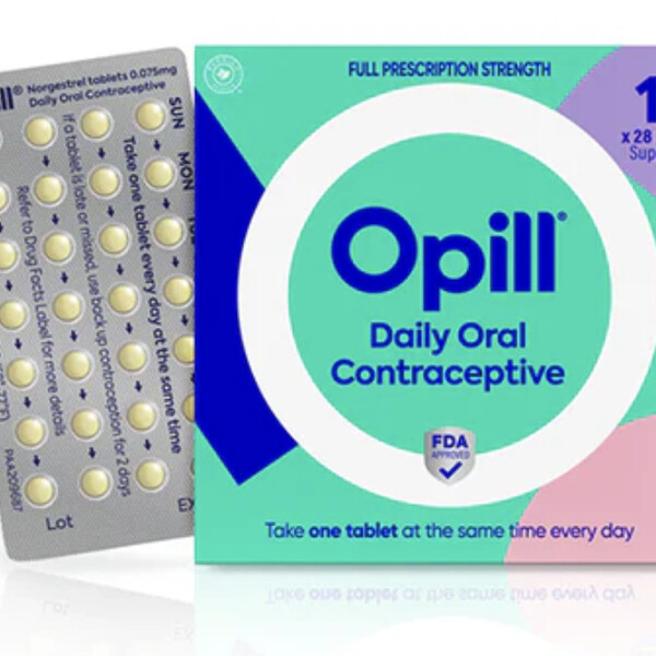 A box of Opill next to birth control pills