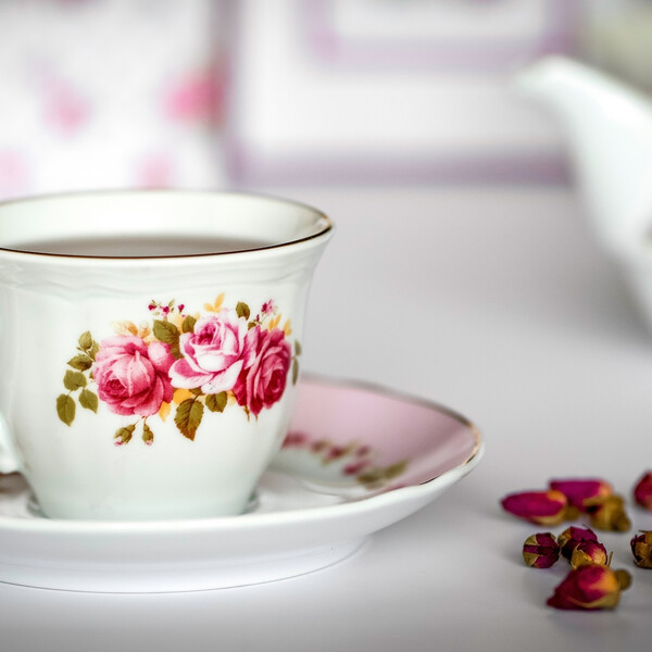 A teacup and saucer on a table