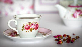 A teacup and saucer on a table