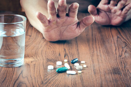 A person refusing pills