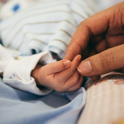 Baby Hand with Adult