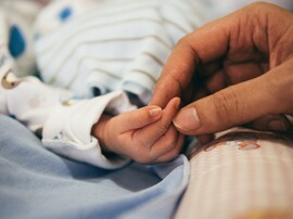 Baby Hand with Adult