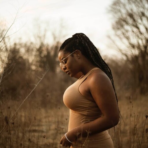 Black woman looking down