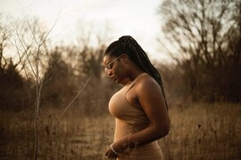 Black woman looking down
