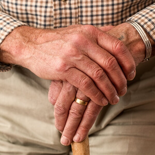 Free old man holding walking stick image, public domain elderly CC0 photo.