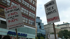 Signs read "End Capitalism End Culture of Rape" and "Unionize Sex Workers."