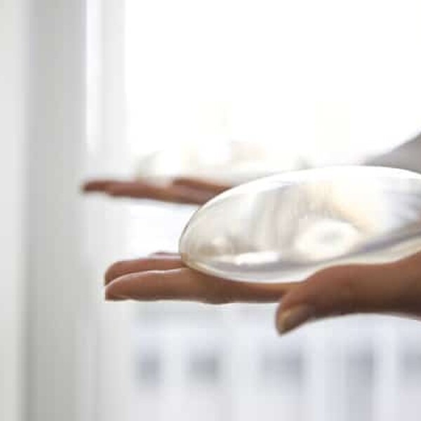 Breast implants in hand 01